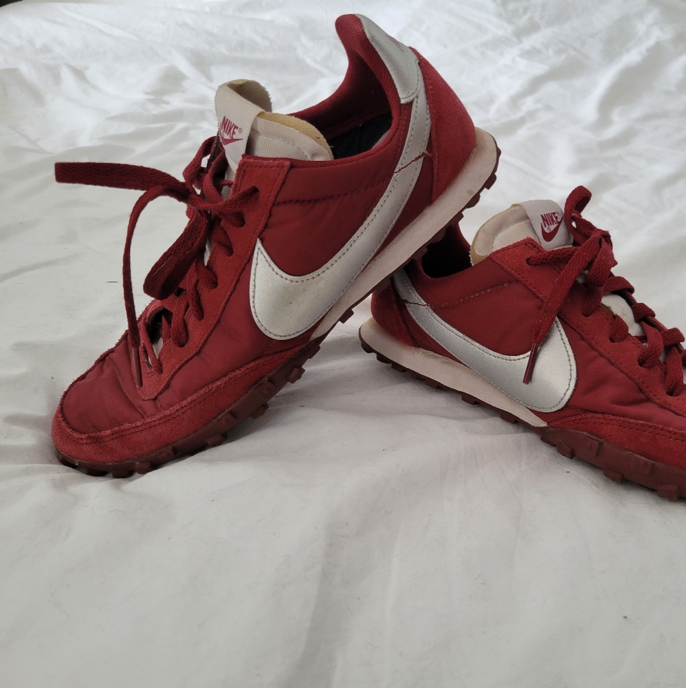 Burgundy and silver Nike sneakers